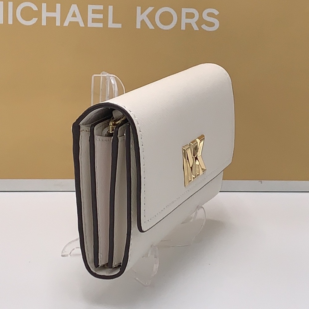 Brand New with Tag
Michael Kors Large Mimi Bifold Wallet
Color: Optic White - Picture 16 of 16